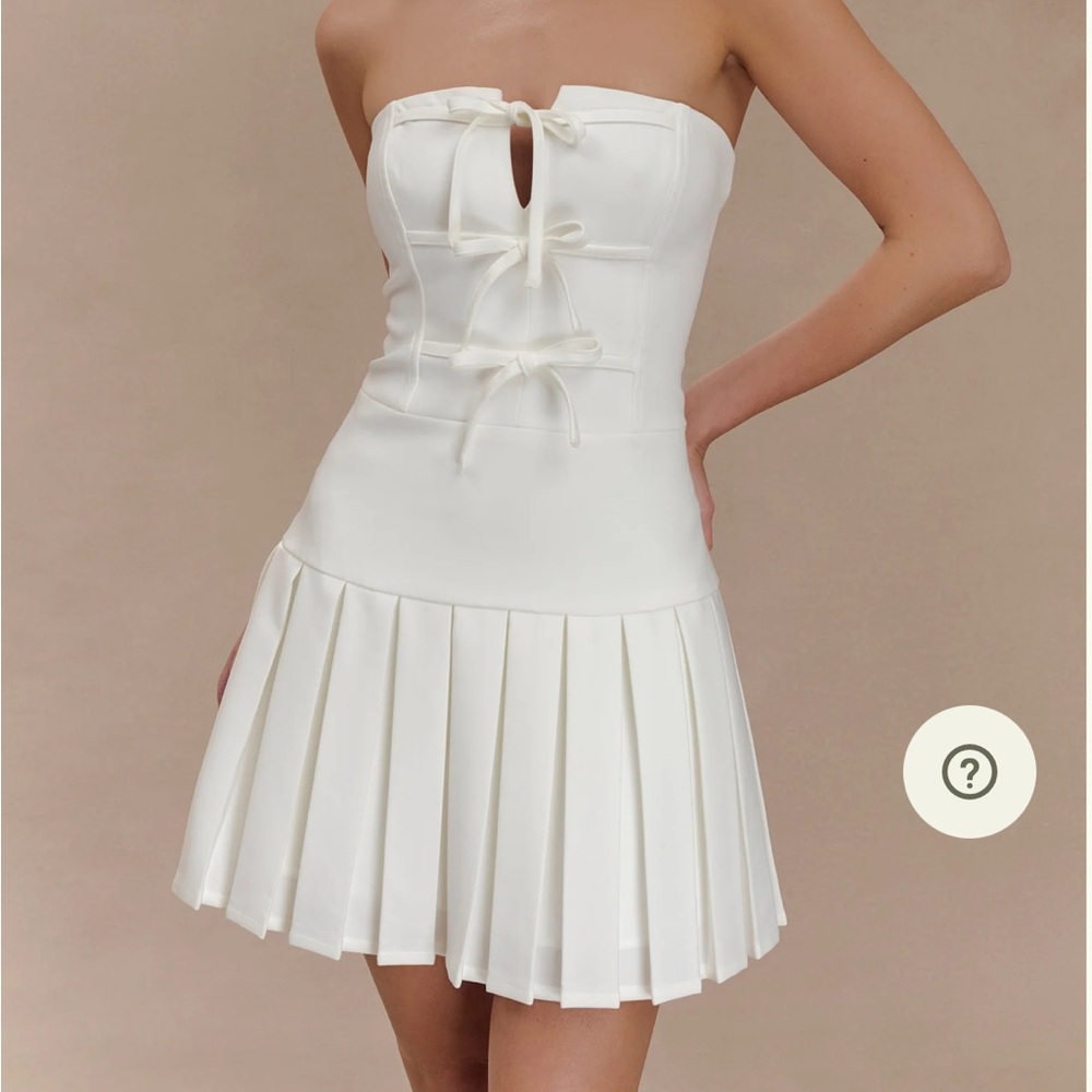 NWT. Brand new MESHKI NAYA dress with tags and original packaging. Never worn.